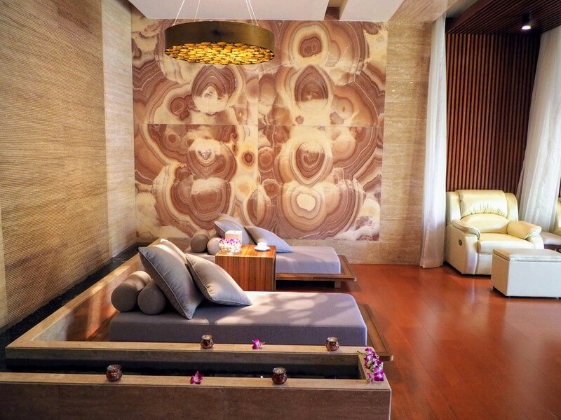 purple loungers on a cherry floor at Senses Health Club spa in Macau